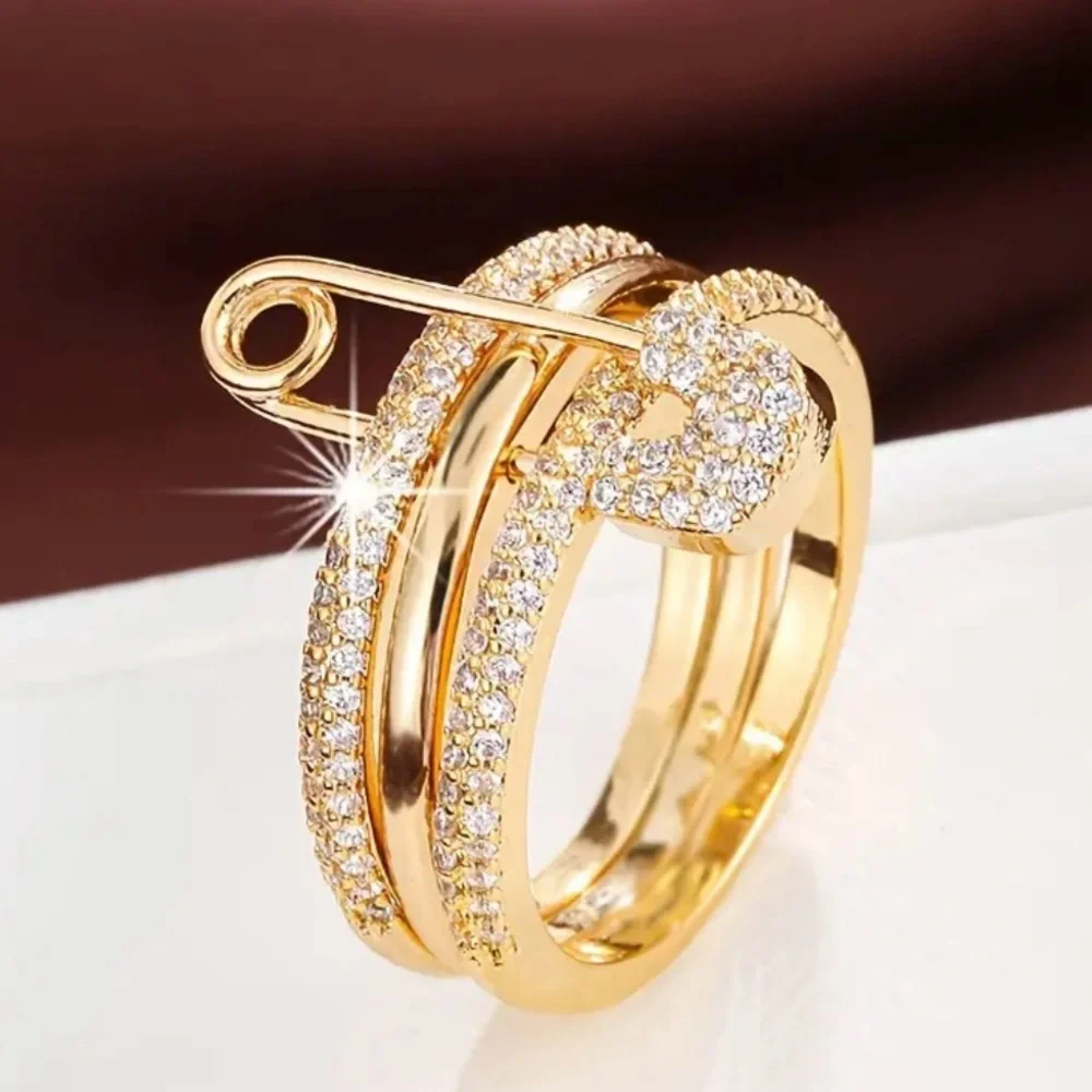 Multi-layer gold tone safety pin ring with cubic zirconia - Picture 1 of 9